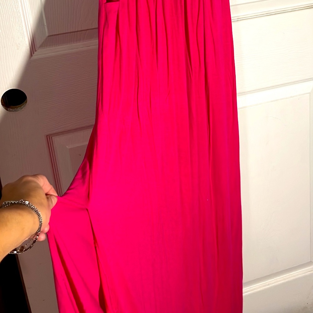 Pink Medium dress with a slit on the side.